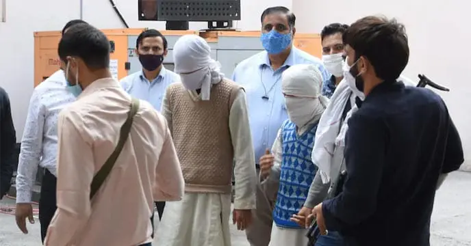 suspected terrorists being taken to the Anti-Terror Cell