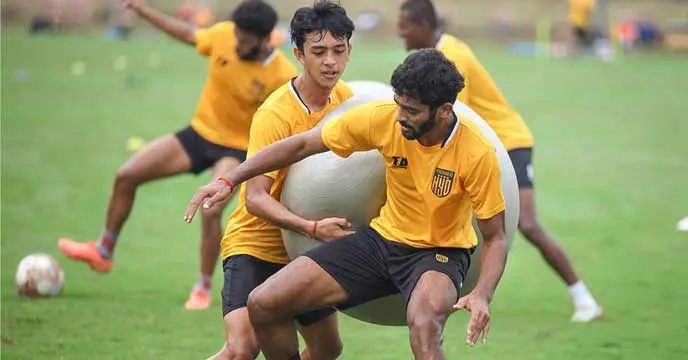 Indian left-back Akash Mishra playing football