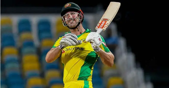 Mitchell Marsh hitting a cricket ball during a match