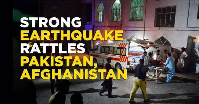 A photograph showing damaged buildings and debris on the street after an earthquake in Pakistan and Afghanistan