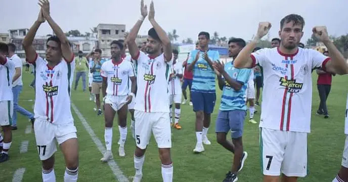 ATK Mohun Bagan team celebrating victory in the Reliance Development League match against Mohammedan Sporting Club.