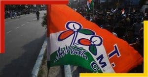 TMC logo with flowers in the background