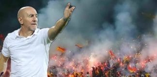 Antonio Lopez Habas, renowned football coach, standing on the sidelines of a football field
