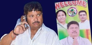 Poster of Arjun Singh with Mamata Banerjee and Abhishek Banerjee