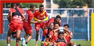 East Bengal football club players celebrating a goal