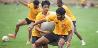 Indian left-back Akash Mishra playing football