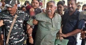 Anubrata Mandal, TMC leader, surrounded by police personnel
