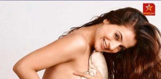 Bollywood Actress Amisha Patel in a bold outfit standing on the red carpet