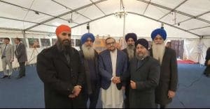 Image of protesters holding posters of Dal Khalsa and accusing them of being ISI agents