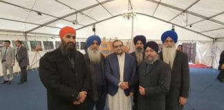 Image of protesters holding posters of Dal Khalsa and accusing them of being ISI agents