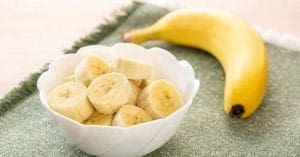 Ripe bananas on a plate with a fork