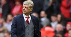 Popular Coach Arsene Wenger posing for the camera