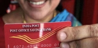 Person updating post office account online before deadline.