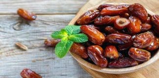 A plate of dates with a caption that reads 'Discover the Power of Dates for Combating Brain Problems