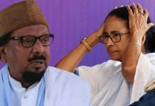 Mamata Banerjee and Abdul Karim Chowdhury smiling and waving hands at a public rally