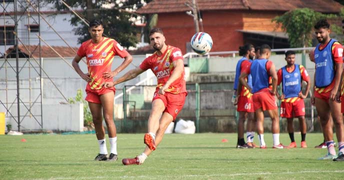 Emami East Bengal Football Club players in action during a match