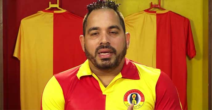Former footballer Alvito D'Cunha speaking at a press conference about the new coach of East Bengal