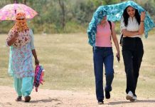 Girls walking in the scorching heat during a heatwave