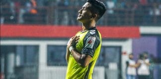 Hyderabad FC star footballer Mohammad Yasir dribbling the ball on the field