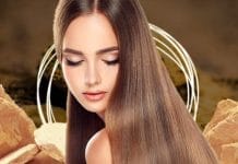 Woman applying Multani Mati hair mask for healthy hair and skin