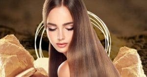 Woman applying Multani Mati hair mask for healthy hair and skin