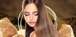 Woman applying Multani Mati hair mask for healthy hair and skin