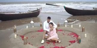 Pritam Kotal and his newlywed wife posing for a photo