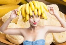 Indian girl enjoying a healthy snack of ripe bananas