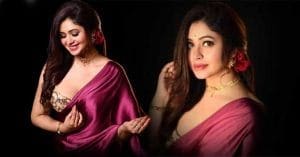 Ritabhari Chakraborty - Indian actress in a red saree, braving the rain