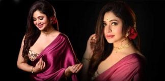 Ritabhari Chakraborty - Indian actress in a red saree, braving the rain