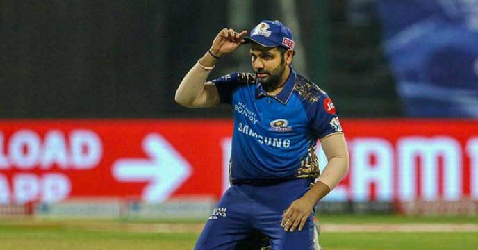 Rohit Sharma hides his face in disappointment after Mumbai Indians' loss to Chennai Super Kings in IPL 2023.
