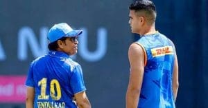 Sachin Tendulkar and Arjun Tendulkar walking off the field together