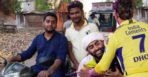 Arijit Singh, the popular Indian singer, smiling for the camera.