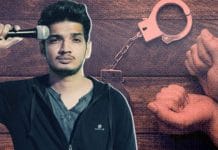 Comedian Munawar Faruqui standing in front of a microphone on stage