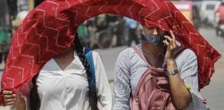Indian girl sweating due to heatwave