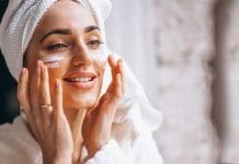 Indian girl applying sunscreen for effective skin care