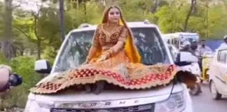 Newly weed bride shoots reel atop car bonnet