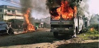 Fire-ravaged buildings in Manipur
