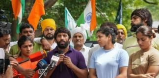 Wrestlers interacting with media