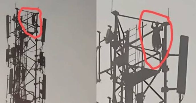 Girl climbs mobile towers
