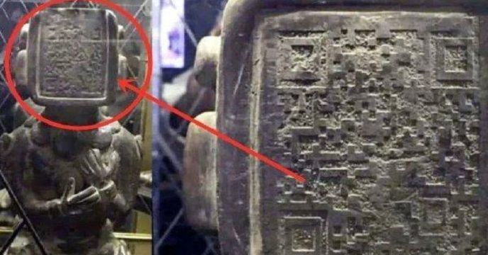 Ancient Maya civilization statue has QR code on its face