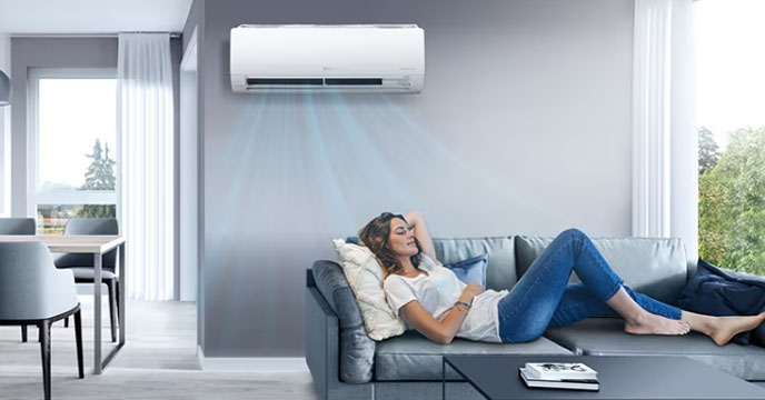 Woman relaxing in an AC room
