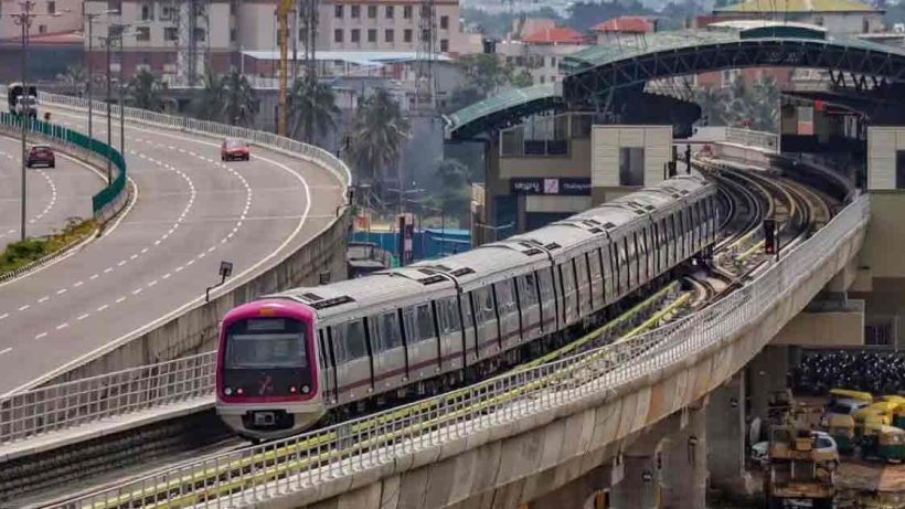 Bengaluru Metro train at a station platform, showcasing modern urban transportation in India.