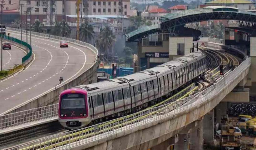 Bengaluru Metro train at a station platform, showcasing modern urban transportation in India.