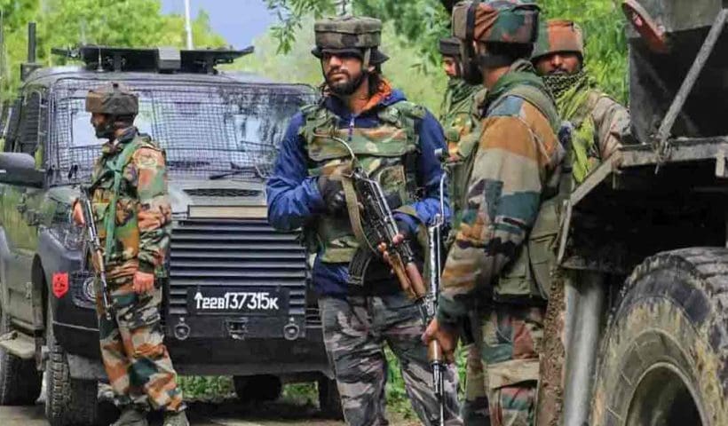 Soldier in Jammu and Kashmir standing guard in mountainous terrain