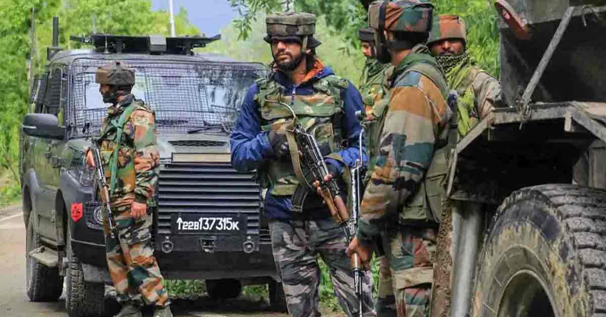 Soldier in Jammu and Kashmir standing guard in mountainous terrain