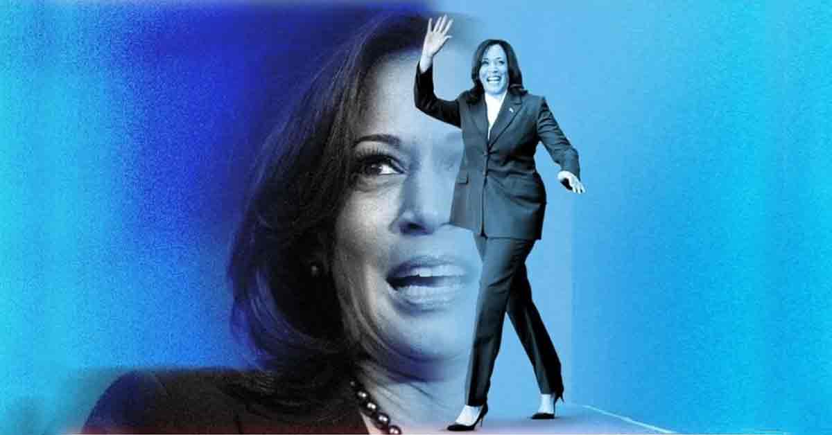 Kamala Harris, U.S. Vice President, speaking at a podium with a microphone. She is dressed in a dark blue suit and has a confident expression. The background features flags and a crowd.