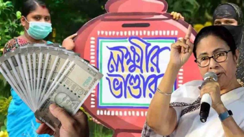 Portrait of Mamata Banerjee, Chief Minister of West Bengal, standing in front of a 'Lakshmir Bhandar' sign