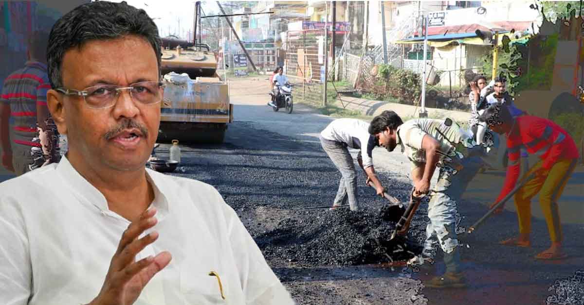 West Bengal Minister Firhad Hakim inspecting road conditions, standing in the middle of a flooded street, surrounded by officials and media personnel, with a serious expression