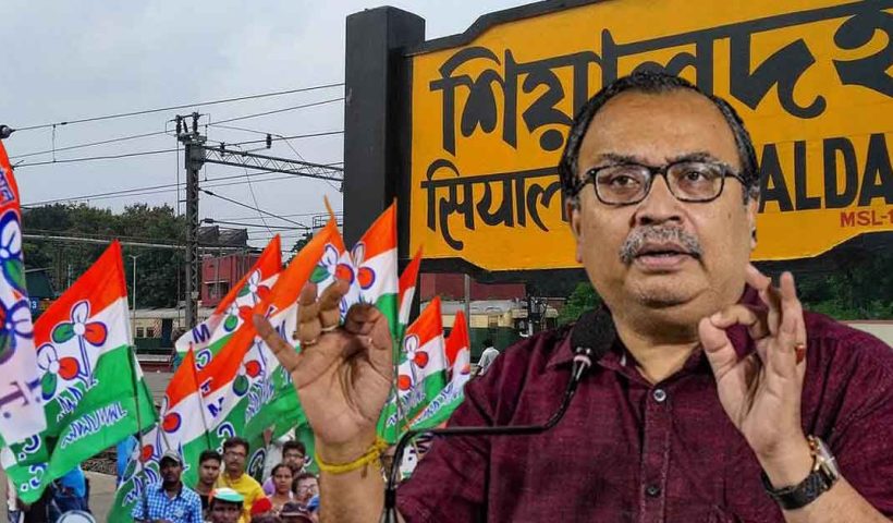 Portrait of Kunal Ghosh, Trinamool Congress leader, with a thoughtful expression, wearing a white shirt and glasses, with a subtle background.